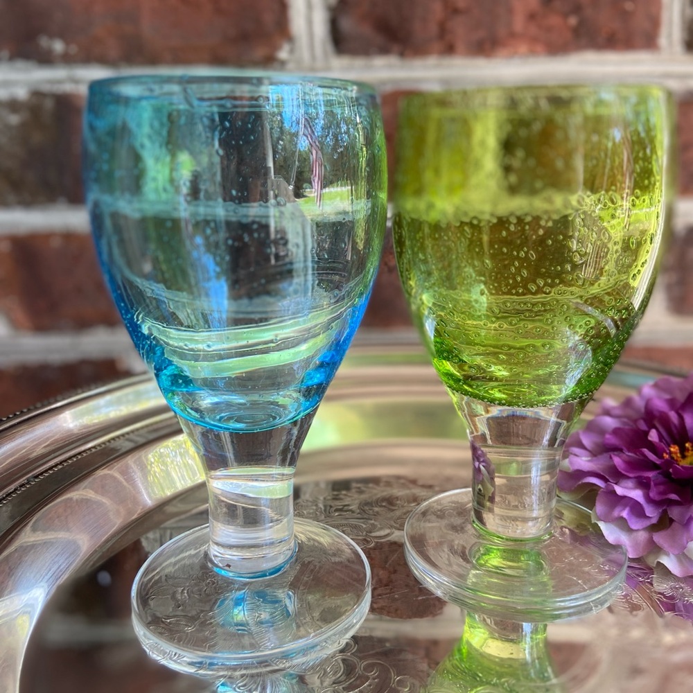 Two artist-made, blown-glass water goblets